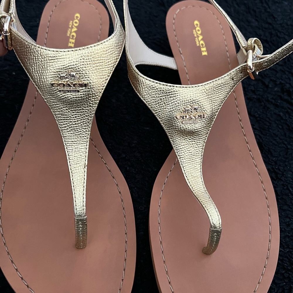 100% authentic brand new ￼Coach sandals size 11 color Brass/ gold